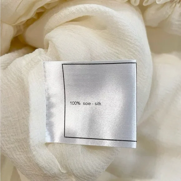 CHANEL Cream Ruffled Long-Sleeve Blouse with Black Bow Accents - Picture 7 of 7